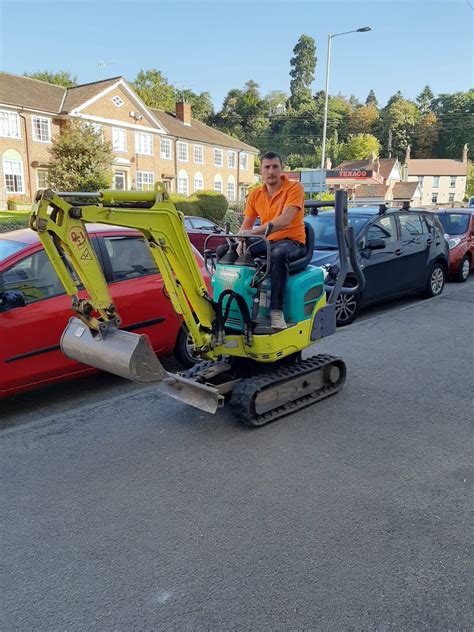 man with mini digger|mini digger hire 2024.